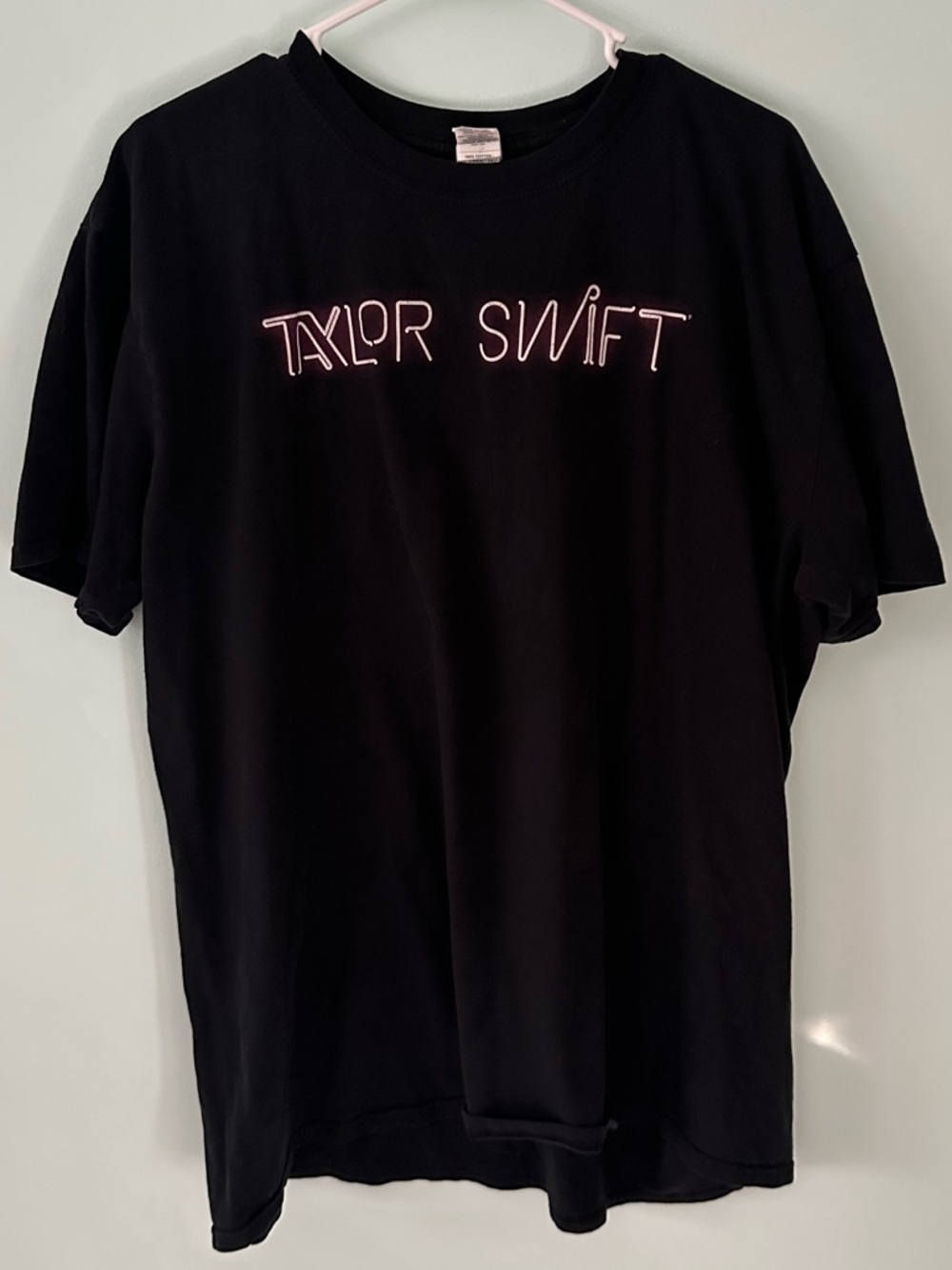 Taylor Swift 1989 World Tour Merch Black Tee with Light Pink Script Logo